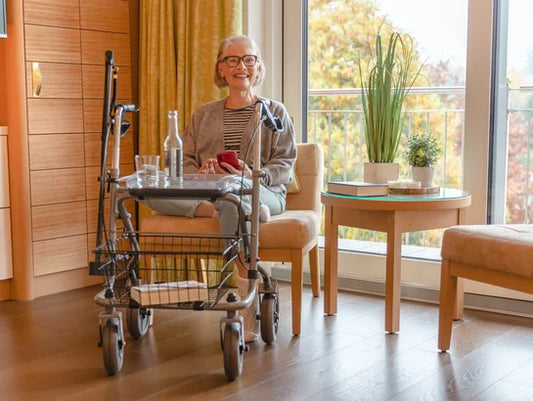 Drive Migo 2G standard rollator with adjustable handles and four wheels, designed for mobility support and stability.