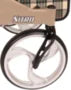 Drive Premium Nitro Rollator with a close-up of the champagne-colored rubber wheel and sturdy frame for enhanced mobility.