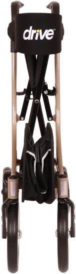 Folded DRIVE Premium Nitro Rollator in champagne color, compact and lightweight mobility aid with ergonomic handles.