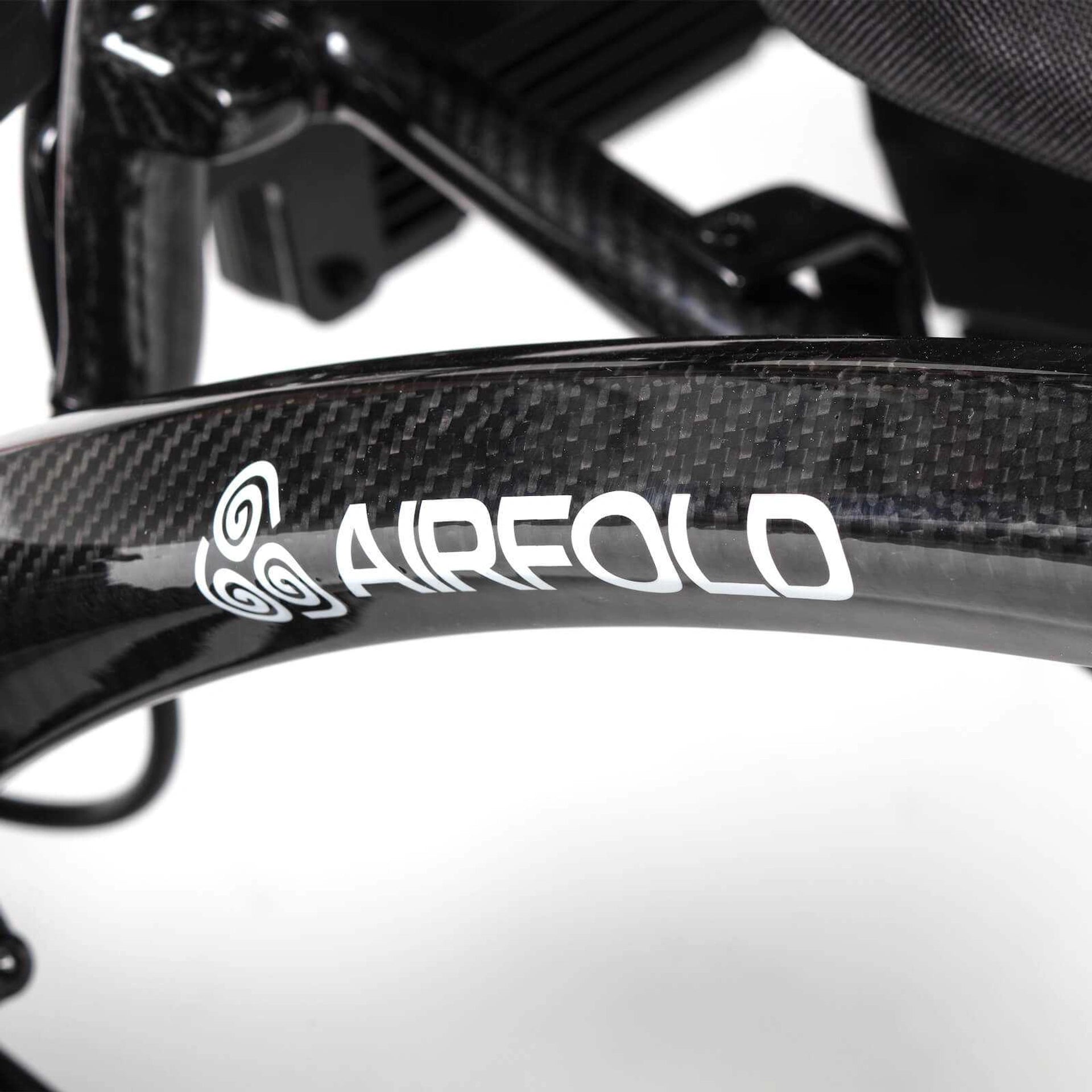 Drive AirFold power wheelchair in black with foldable design, compact and lightweight for easy mobility and transport.