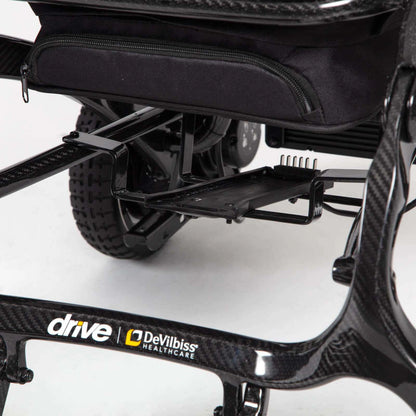 Black Drive AirFold power wheelchair with compact design and sturdy frame, suitable for indoor and outdoor mobility.