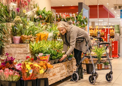 Drive Gigo 2G lightweight rollator with sturdy frame, comfortable seat, and hand brakes for easy mobility and support.