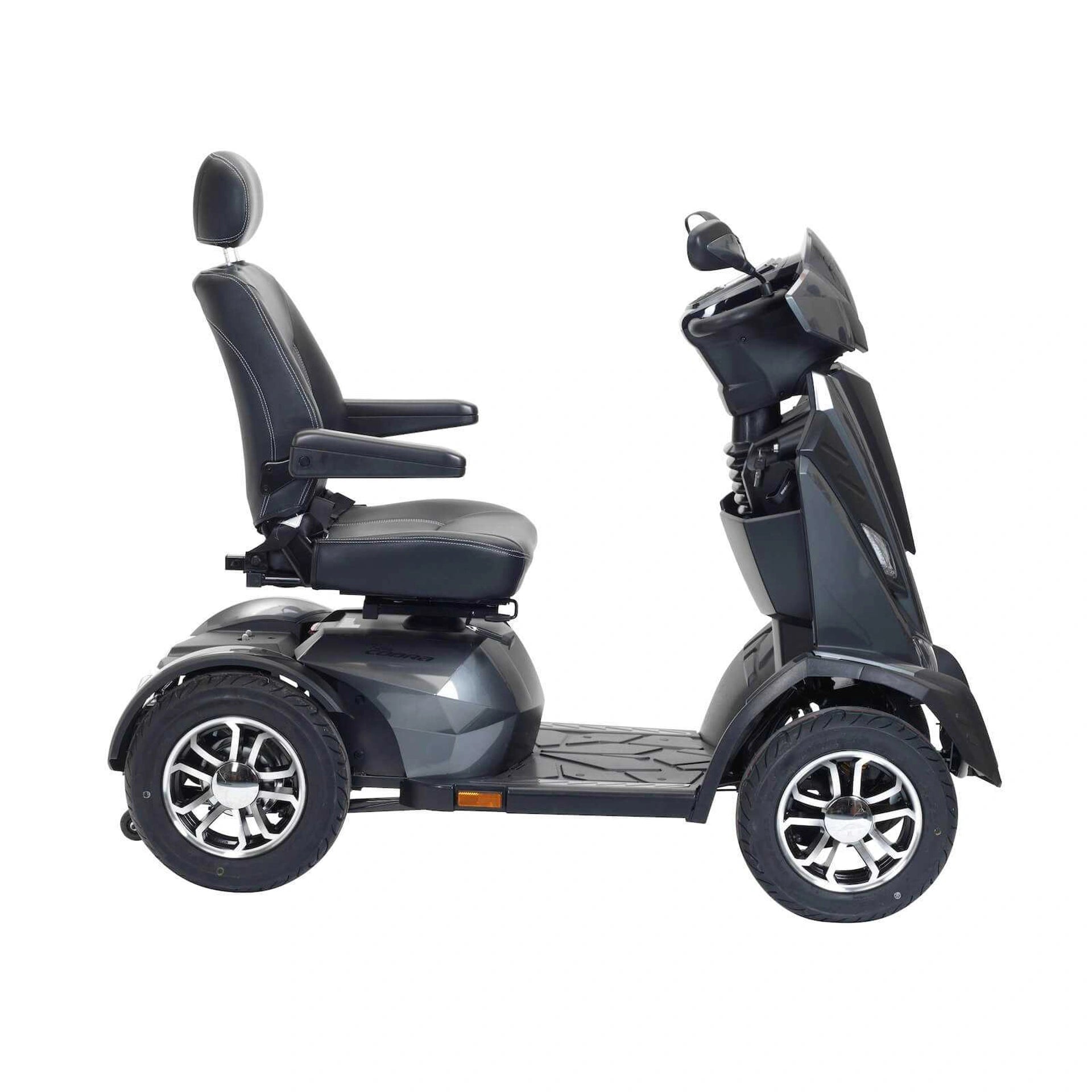 Drive King Cobra mobility scooter with sturdy frame, comfortable seat, and advanced controls for easy outdoor transportation.