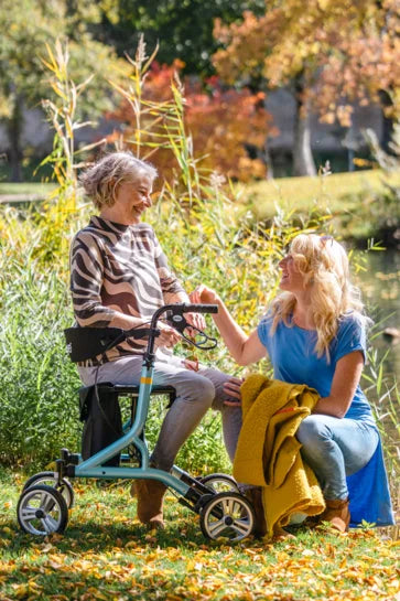 Drive Nitro SL lightweight rollator with padded seat and storage pouch, designed for easy mobility and comfort.