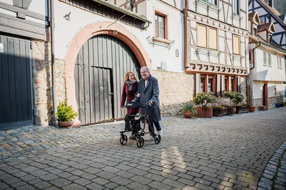 Drive Torro rollator with comfortable seat, four wheels, and ergonomic handles for easy mobility and support.