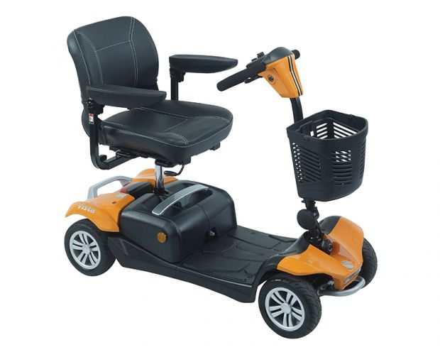 Electric Mobility Rascal Vista mobility scooter parked outdoors with seat and control panel visible.