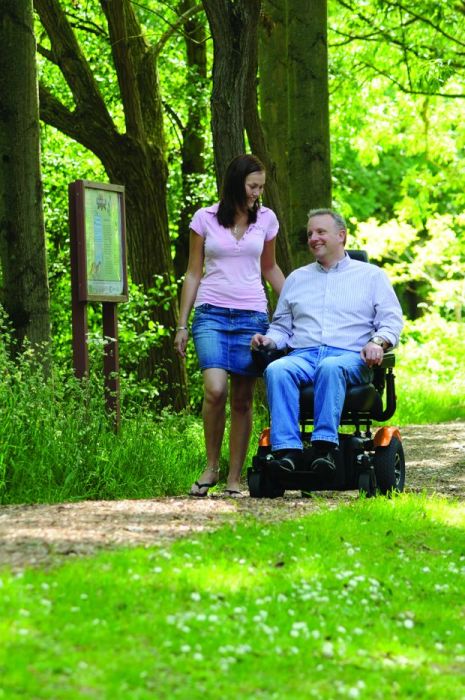 Electric Mobility Rascal Rivco power wheelchair with a sleek design, comfortable seat, and control panel for easy mobility.