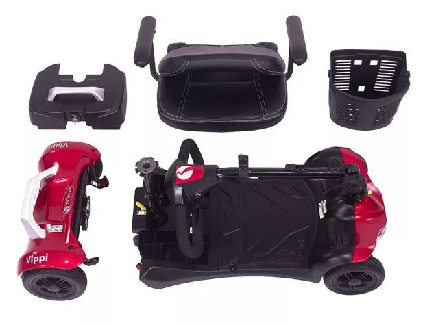 Red Electric Mobility Vippi mobility scooter shown dismantled for transport, highlighting compact design and key components.
